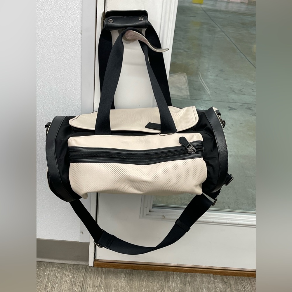 COACH duffel bag. Beautiful. No scuffs on bottom, no rips, tears, stains.
